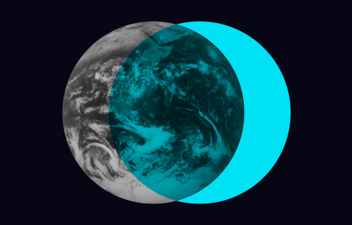 Black & white earth from space with cyan circle over.